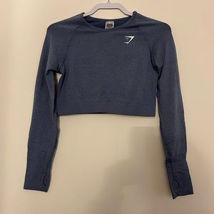 Gymshark size Large. Blue long sleeve crop top with thumb hole.